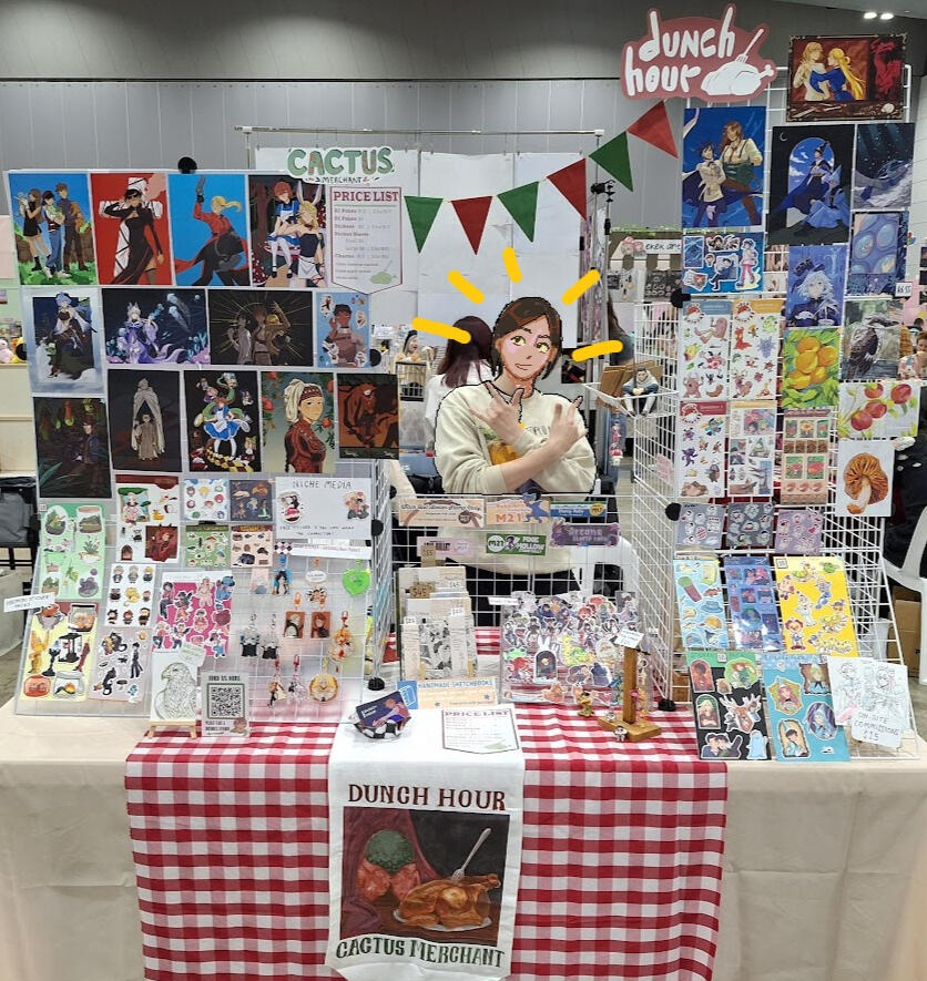 Dunch hour and cactus merchant's table display from Melbourne kaiga con 2025.
